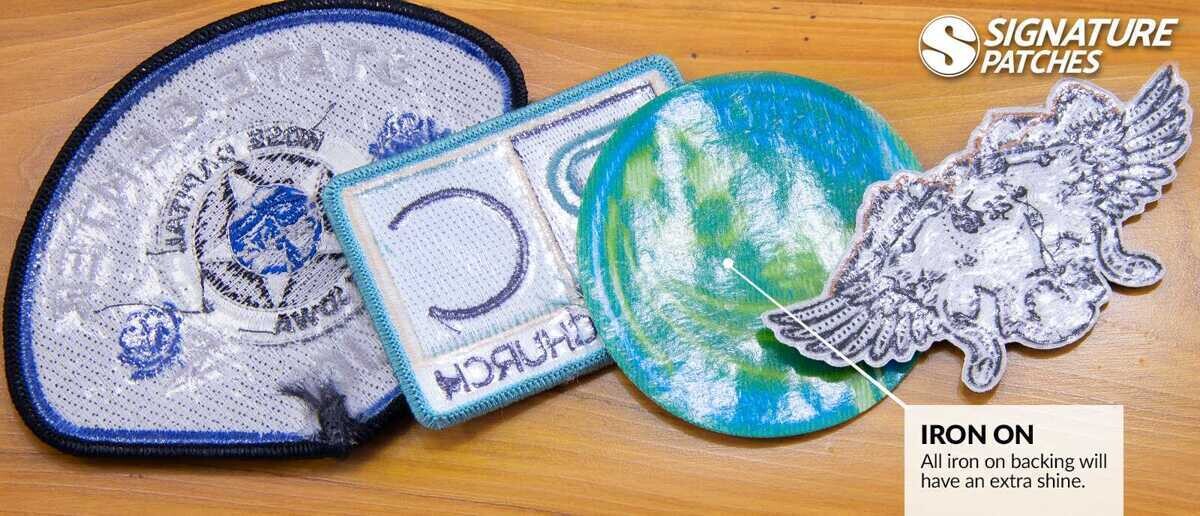 Collection of custom iron on patches with various embroidered designs and backing options