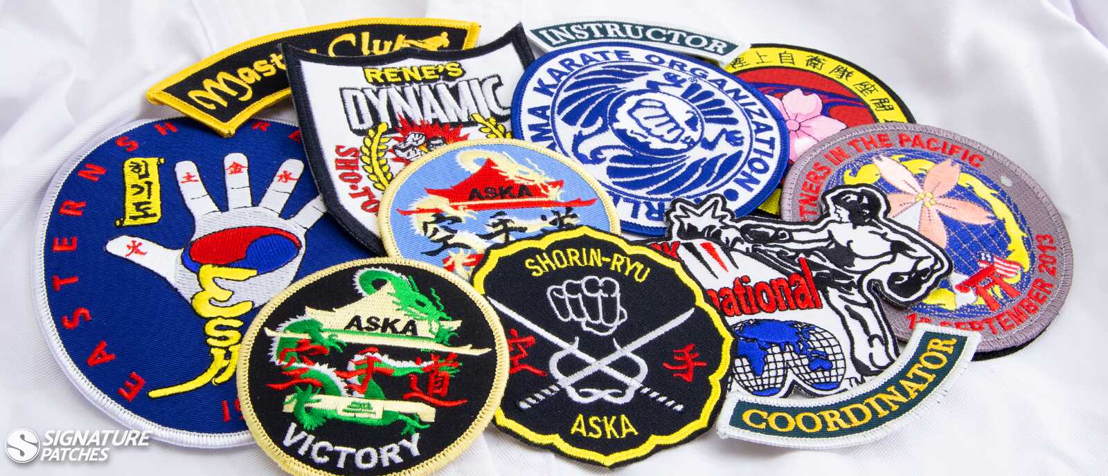 Custom martial arts and karate patches with dojo logos and dragon designs
