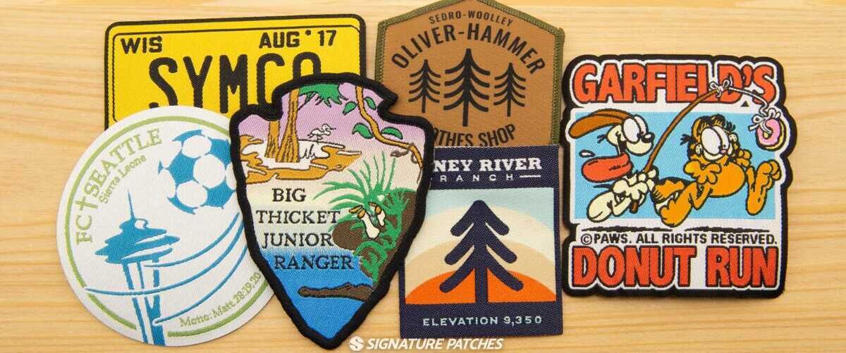 Assortment of custom woven patches with various designs and backing options